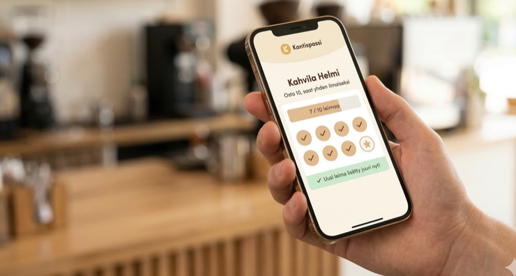 Kantispassi-leimakortti puhelimen näytöllä